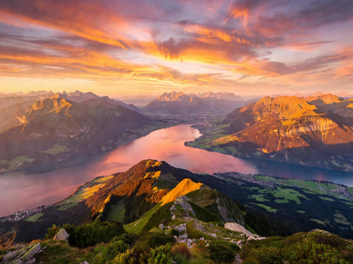 Expansive view from Mount Rigi overlooking Lake Lucerne at sunset